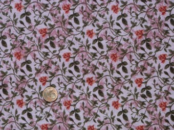 Tissu patchwork rose à fleurs orangées et feuilles vertes